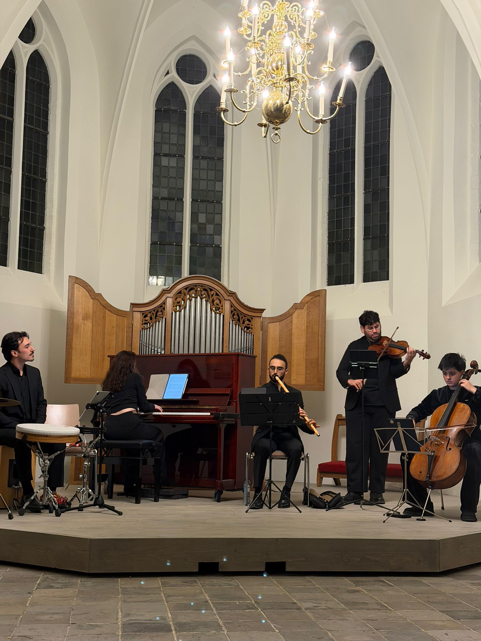 HarmonEast Ensemble performing in a church